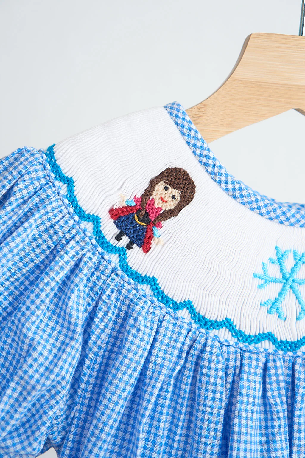 Blue snow princess hand smocked gingham girl romper - Image 4